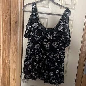 Very soft torrid top! Size 1. Barely worn. Has cut outs on shoulders.